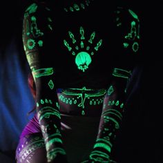 a woman wearing glow in the dark clothing