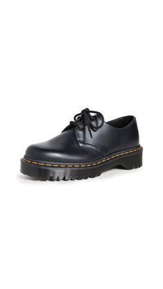 PRICES MAY VARY. Dr. Martens classic Smooth leather Made with classic Doc's DNA, including grooved edges and visible stitching Built on the signature Dr. Martens air-cushioned sole, which is oil and fat resistant, with good abrasion and slip resistance Extra chunky, extra rugged Bex sole Doc Martens Homme, Foot Injury, Jeans And Flats, Doc Marten Oxford, Unisex Shoes, Shoe Size Conversion, Doc Martens, Who What Wear, Dr. Martens