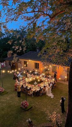 an aerial view of a wedding reception in the evening