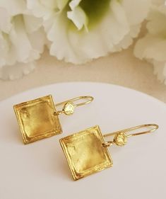 "18K Gold Plated handmade hammered Square earrings dangling from 18K Gold plated over silver ear wires. Lightweight and comfy to wear these earrings are excellent sparkle for everyday! * They will make a great gift! * Total length of the earrings is 35 mm/ 1.4\" approx from top to bottom. * Weight: 3.5 Grams * Material: 18k Gold Plated * The gold plating is a high quality 3 microns 18k gold thick * The Pendants are 15 mm/ 0.6 inches Long. * Ear wires are gold plated over silver * All earrings wi Gold Square Earrings, Thick Gold Ring, Valentines Gift Ideas, Wide Wedding Rings, Wedding Rings Photos, Hammered Earrings, Rectangle Earrings, Gold Statement Ring, Earring Gold