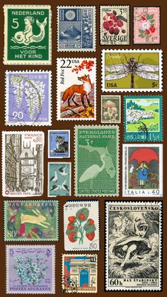 many different postage stamps on a brown background