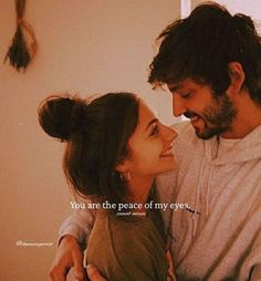 a man and woman smiling at each other with the caption you are the peace of my eyes