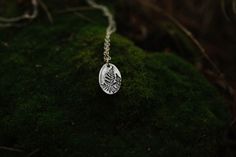 **please note turnaround time on this item is 1-2 weeks.A sterling silver pressed fern charm is hung on a dainty sterling silver chain. Charm is 2/3" long. Chain is 17" long. Length of chain can be adjusted upon request. Forest Fern, Pressed Fern, Fern Necklace, Geometric Bear, Cape Canaveral, Glass Locket, Bear Necklace, Crescent Moon Necklace, Earrings Photo