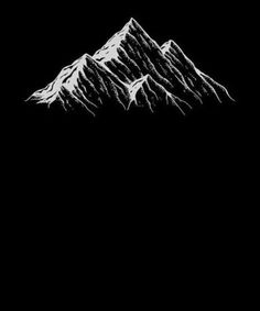 a black and white photo of mountains in the dark