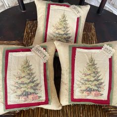 four christmas pillows on a wicker chair