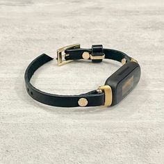 Black Leather & Gold Fitbit Inspire 3 Bracelet Slim Band! Classic 8mm Genuine Leather Strap with Adjustable Buckle! Designed And Handmade by Simeon D Jewelry Studio! Adjustable Size Bracelet Perfectly Tailored to Fit Your Wrist!  Please Measure Your Wrist Before You Purchase Your Gorgeous Bracelet! Not For Other Models. Fitbit Tracker Is NOT Included Follow my Studio on Social Media for Updates & New Designs Make a Fashion Statement Every Place You Go! Get Tons of Compliments Wearing Your Beauti Smart Jewelry, Jewelry Studio, Gorgeous Bracelet, Beautiful Bracelet, Arm Band, Fitbit, Fashion Statement, Soft Leather, Leather Straps