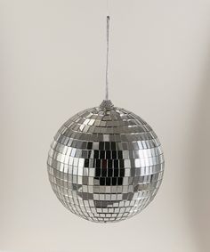 a silver disco ball hanging from a ceiling