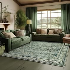 a living room filled with furniture and green curtains