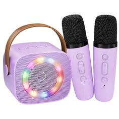 two microphones and a speaker are shown in this image, one has a light purple color