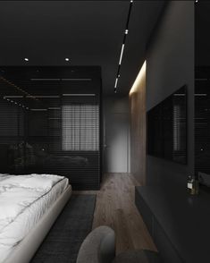 a large bed sitting in a bedroom next to a wall mounted flat screen tv on top of a wooden floor