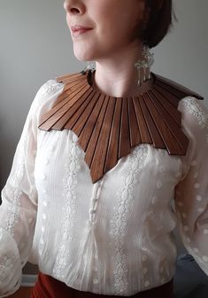 "One of a kind wooden collar neck/shoulder piece inspired by Ruth Bader Ginsburg dissent collar.  Walnut wood that was reclaimed from a cabinet shop dumpster. Glued to leather so it is comfortable and flexible to bend and curve over the human shape. Perfect for any occasion dressy to casual. Flat it measures at approx 15.5\" x 12\"." Knitting Quilt, Shoulder Piece, Temple Dress, Wood Clothes, Best Small Business Ideas, Ruth Bader Ginsburg, Whimsical Fashion, Neck Piece, Leather Collar