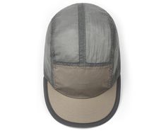 a gray and tan hat on a white background with the word, no one is wearing it