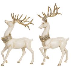 two white deer figurines standing next to each other