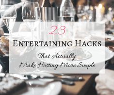 a table with wine glasses, plates and silverware on it that says 23 entertaining hacks that actually make hosting more simple