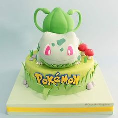 the cake is decorated with an image of pikachu's hat and mushroom