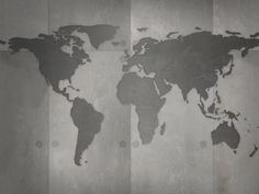 a world map is shown on the wall