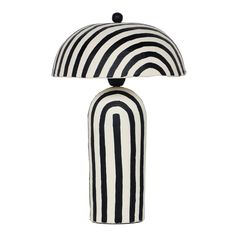 a black and white striped lamp on a white background