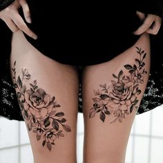 a woman's thigh with flowers on it