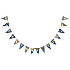 a triangle shaped necklace with blue and gold triangles hanging from it's sides, on a white background