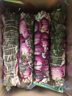 several bundles of radishes wrapped in string