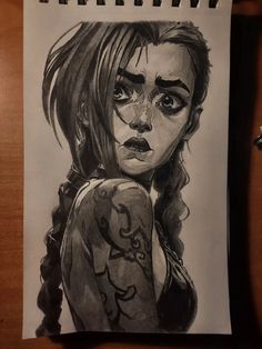 a drawing of a girl with tattoos on her arm