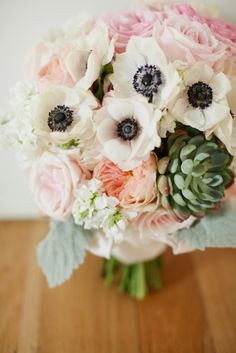 the bridal bouquet is displayed on an instagramture for brides and grooms