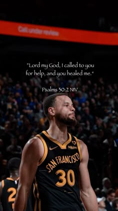 a basketball player standing in front of a crowd with a quote above him that reads, lord my god, i called to you for help, and you sealed me