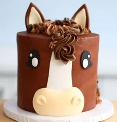 a chocolate cake decorated with a horse's head