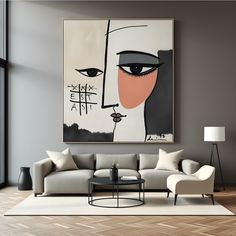 a living room with a large painting on the wall