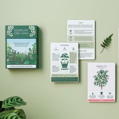 four cards with plants and instructions on the wall next to a potted green plant