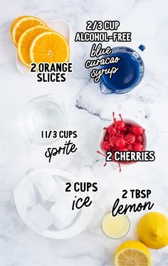 the ingredients needed to make an orange and raspberry smoothie on a marble counter top