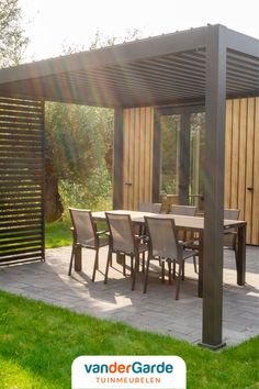 an outdoor dining table and chairs under a pergolated roof with the sun shining on it