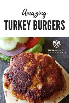 an image of turkey burgers on a plate with lettuce and tomato in the background