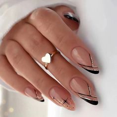 This nail design showcases a sleek, modern aesthetic with a nude base accented by bold black tips and geometric lines. 🖤✨ Subtle glitter details and metallic gold stripes add a touch of glam, making it perfect for a chic, sophisticated look. 💅⚡ Early Fall Nails, Geometric Nail Art, Geometric Nail, Almond Shape Nails, Gold Nail, Nail Designs Spring