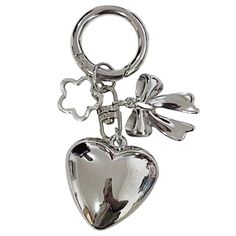 Modern Heart Key Chain with Stylish Bowknot Pendant for Bag or Key Accessory Features: Elevate your with this alloy keychain featuring a heart shaped pendant. Crafted from quality alloy material, this keychain is built to last without rusting. Perfect for individuals who appreciate fashionable accessories that complement their taste. Whether you're heading to work or going out for a night out, this versatile keychain can be used to decorate keys, bags, and more. Make a thoughtful choice with this jewelry keychain, suitable for various occasions and expressing your unique Specifications: Alloy Size: As Shown in the Picture Package Includes: 1x Heart Keychain note: Please allow 1-2cm errors due to manual measurement. Please make sure you do not mind before you order. Due to the difference be Cute Keychains For Backpacks, Fancy Keychain, Cute Keychains For Car Keys, Bag Accessories Keychain, Y2k Keychain, Keychain Packaging, Key Organization, Heart Key Ring, Jewelry Keychain