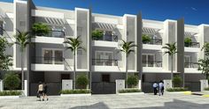 two people walking in front of an apartment building with balconies and palm trees