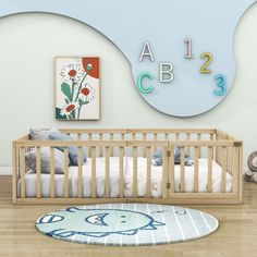 a baby's room with a crib, teddy bear and clock on the wall