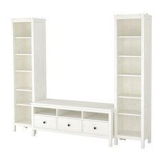 a white bookcase with drawers and shelves next to each other on a white background