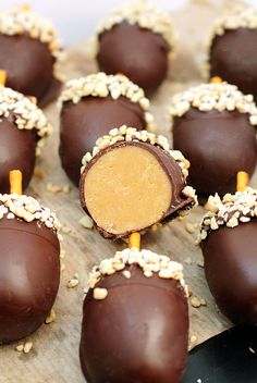 chocolate covered candies with peanut butter on top