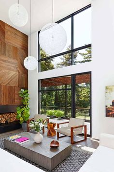 modern living room with wood paneling and large windows