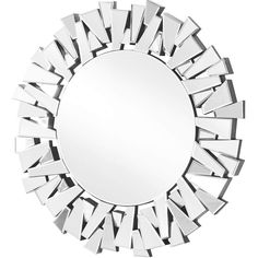 a mirror that is sitting on top of a white surface with many mirrors around it