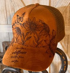 I'm excited to share my new Sunflower  design on a  baseball cap.  One size fits most.  Color hat: Sage green, pink, gray, brown  This hat has snaps in the back to adjust to your head size.  Message me and I can personalize it with a bible verse, special saying, name, or a date. Burned Hats, Hat Burning, Hat Bar, Beautiful Sunflowers, Flowers Butterfly, Sunflower Design, Ball Cap, Pink Gray