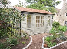 a small garden area in front of a house