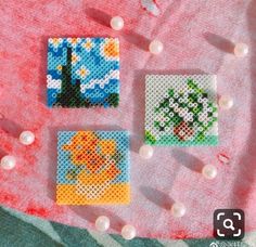 three different types of beaded pictures on a pink blanket