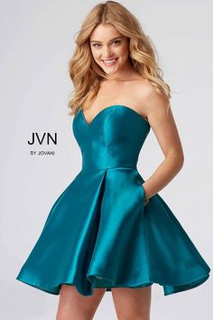 Teal strapless fit and flare short dress with pockets. Fit and flare Jovani Homecoming Dresses, Junior Homecoming Dresses, Ireland Dress, Paralyzed Man, Prom Dress Couture, Vegas Outfits, Simple Homecoming Dresses, Fit And Flare Cocktail Dress, Short Party Dresses