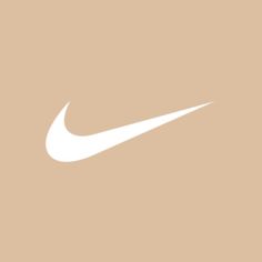 a white nike logo on a tan background