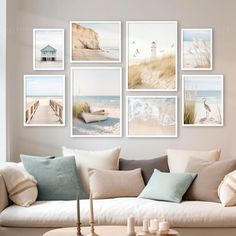 a living room filled with lots of furniture and pictures on the wall above it's coffee table