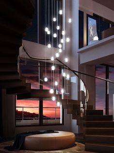 a spiral staircase with lots of lights hanging from it