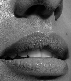 a woman's lips with her mouth open