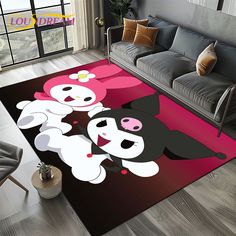 a living room area rug with two cartoon pandas on it and a couch in the background